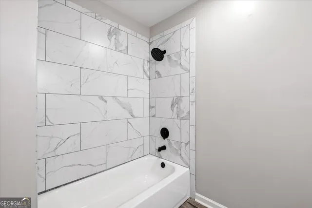 a bathroom with a bathtub