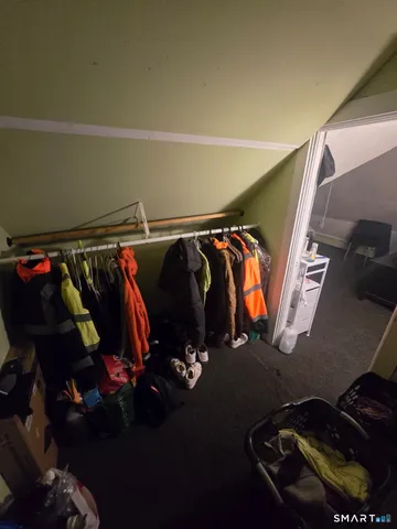 a room with lots of wooden furniture