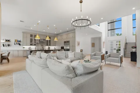 a kitchen with stainless steel appliances granite countertop a stove and a sink