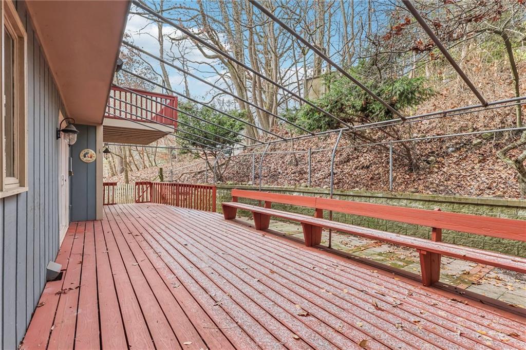 1577 Bellmonte Road Pittsburgh, PA 15237 - Photo 18 of 19 Deck off of the kitchen and the Den. Overlooking the wooded yard.