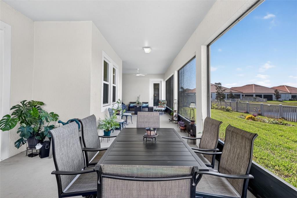 17109 Star Banks Street Wimauma, FL 33598 - Photo 32 of 60 a view of a dining room with furniture window and outside view