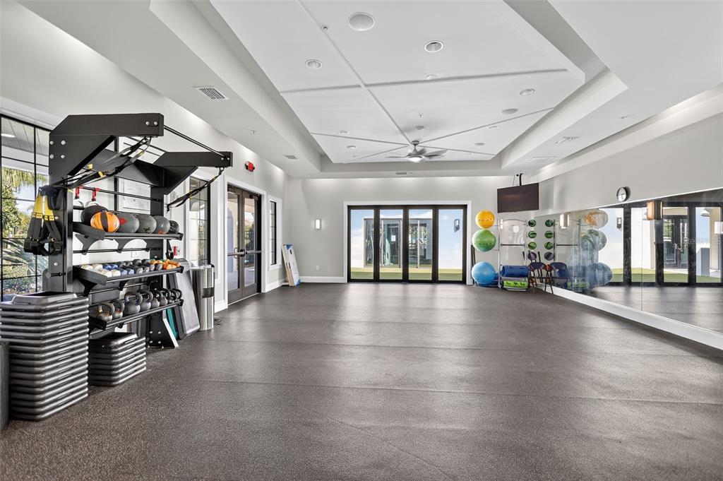 17109 Star Banks Street Wimauma, FL 33598 - Photo 51 of 60 a view of a room with lots of wooden furniture