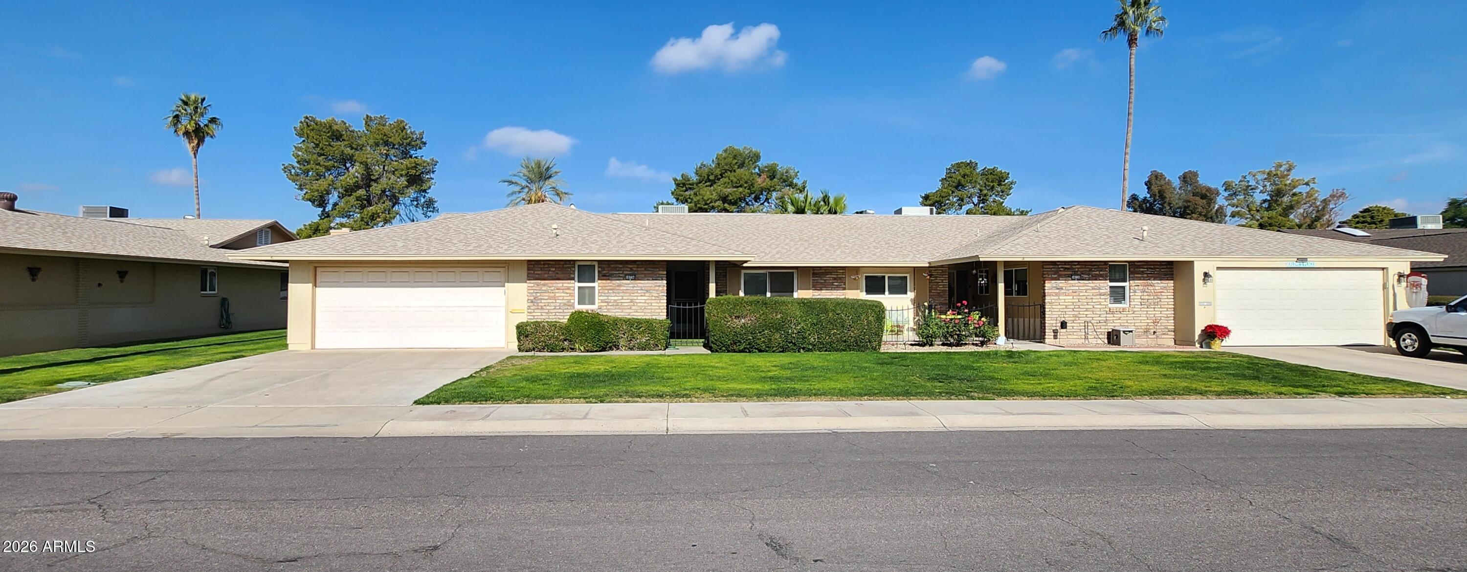 10734 West Hatcher Road Sun City, AZ 85351 - Photo 1 of 24