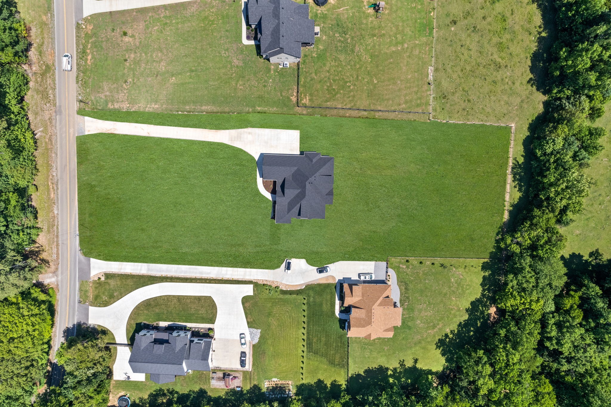 1025 Hickory Point Road Clarksville, TN 37043 - Photo 54 of 60 an aerial view of a house with outdoor space swimming pool outdoor seating and yard