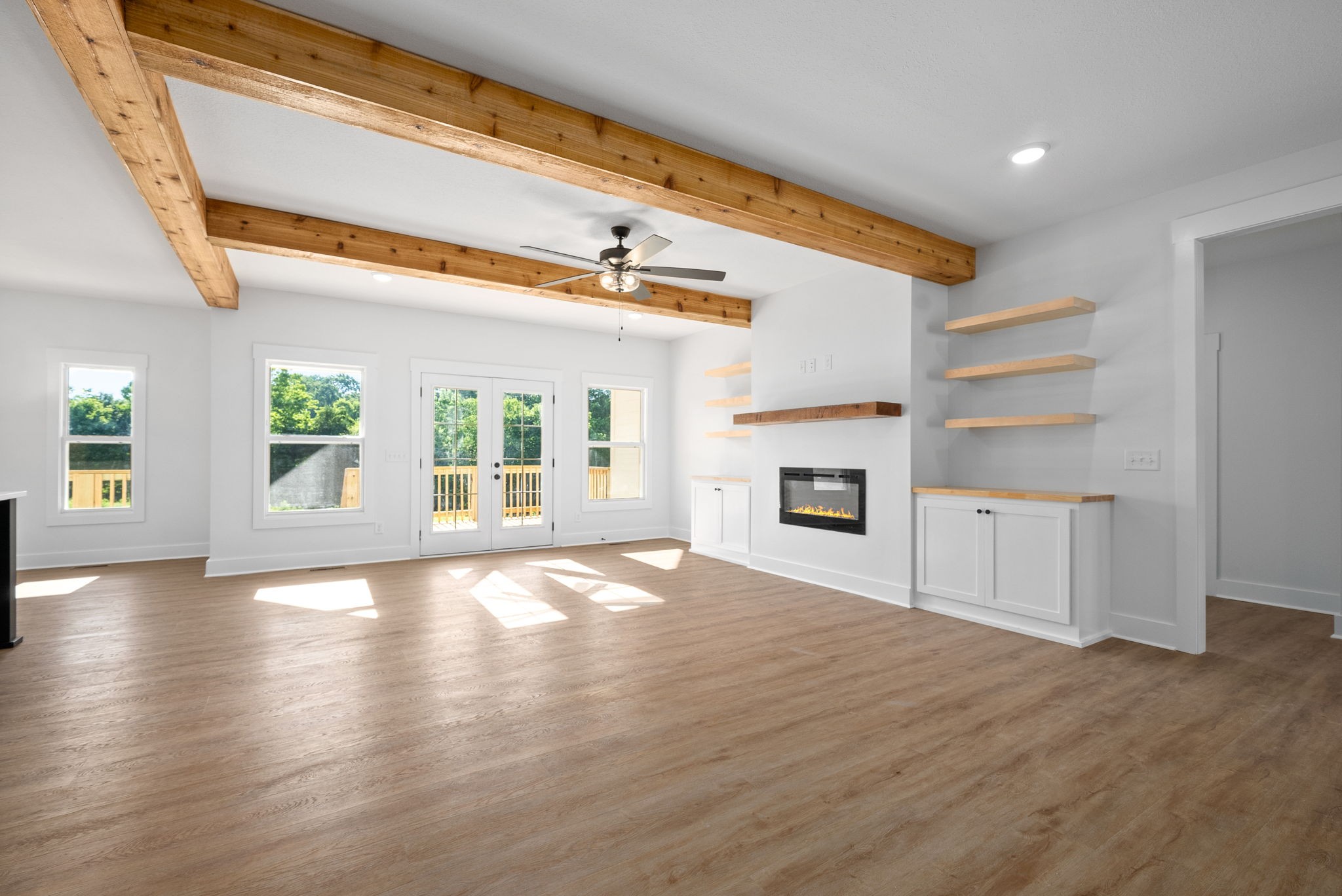 1025 Hickory Point Road Clarksville, TN 37043 - Photo 9 of 60 wooden floor in an empty room with a window