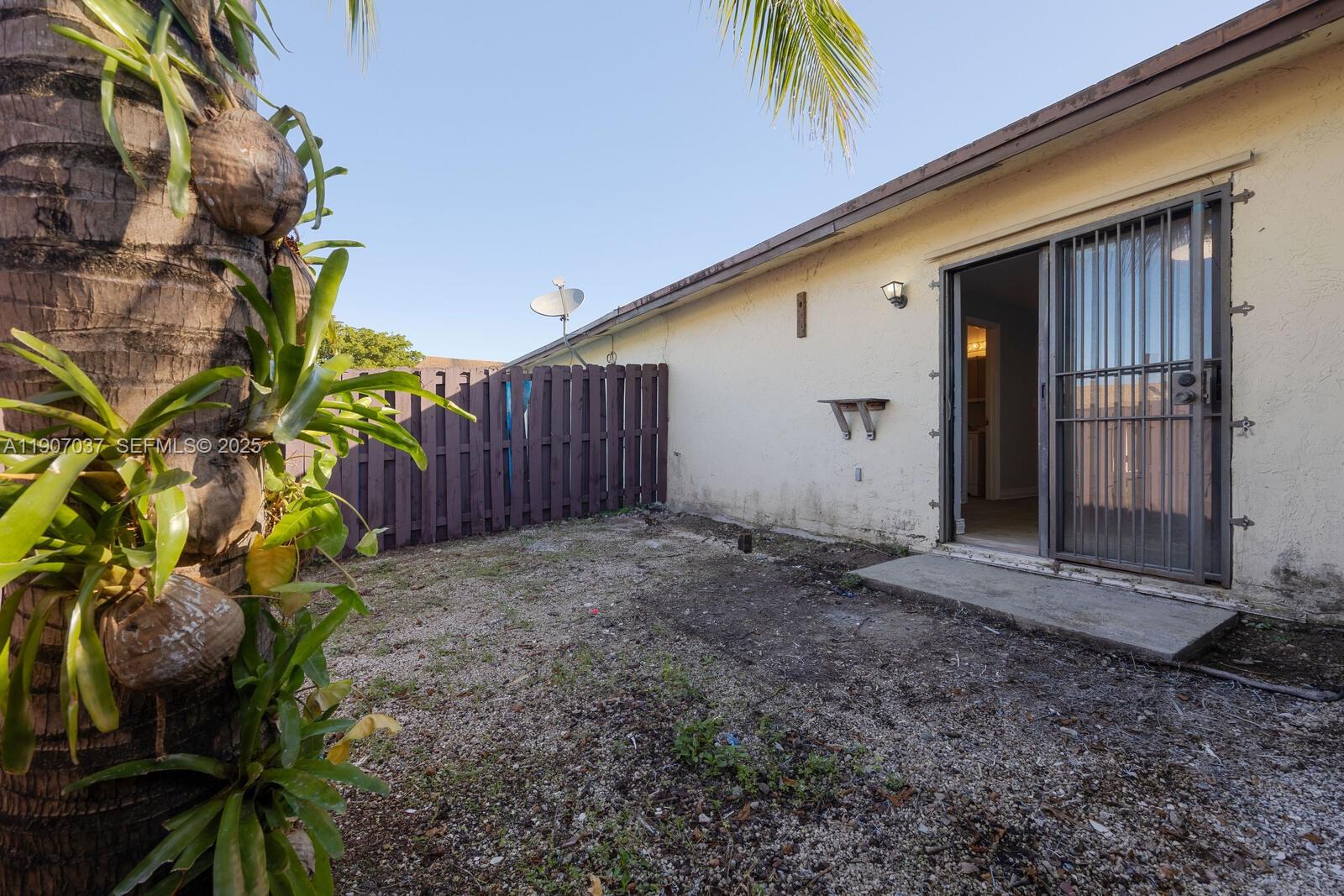 28147 Southwest 142nd Court Homestead, FL 33033 - Photo 15 of 16 a view of a backyard