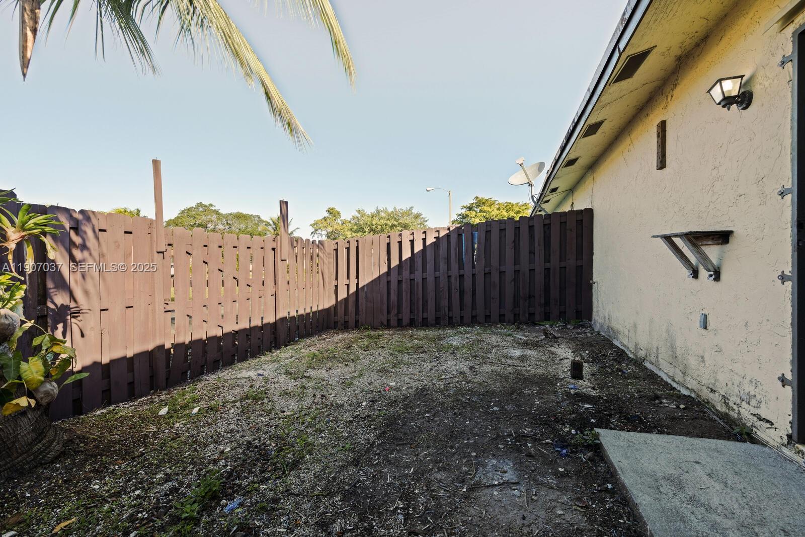 28147 Southwest 142nd Court Homestead, FL 33033 - Photo 16 of 16 a view of a backyard