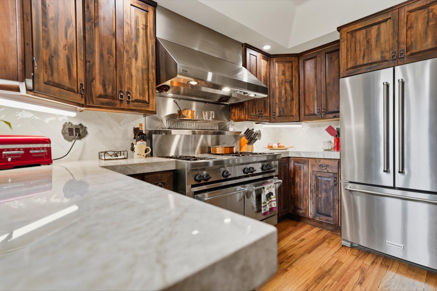39000 Kearsarge Mill Road Alta, CA 95715 - Photo 18 of 65 a kitchen with stainless steel appliances granite countertop a refrigerator stove and sink