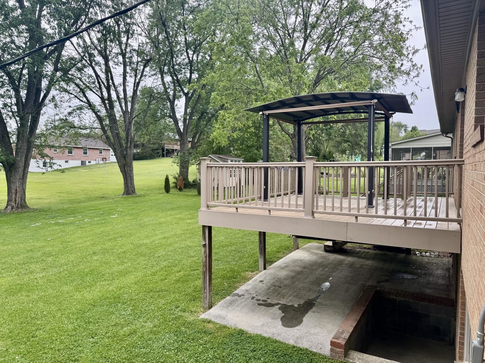 81 Middlebrook Street Harrisonburg, VA 22801 - Photo 19 of 22 a view of a deck with a table chairs and a yard