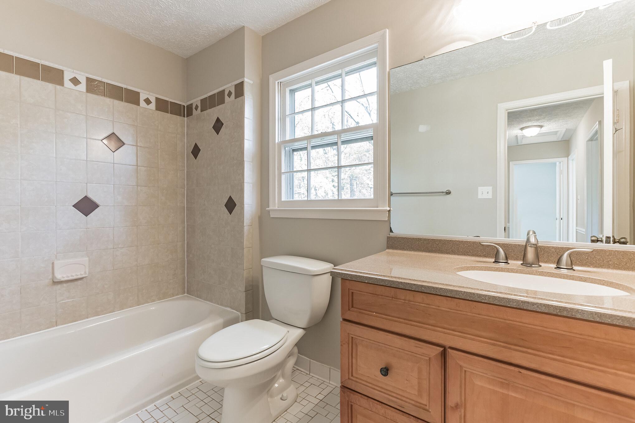 12905 Ruxton Road Silver Spring, MD 20904 - Photo 25 of 31 Updated full bathroom off upper hallway