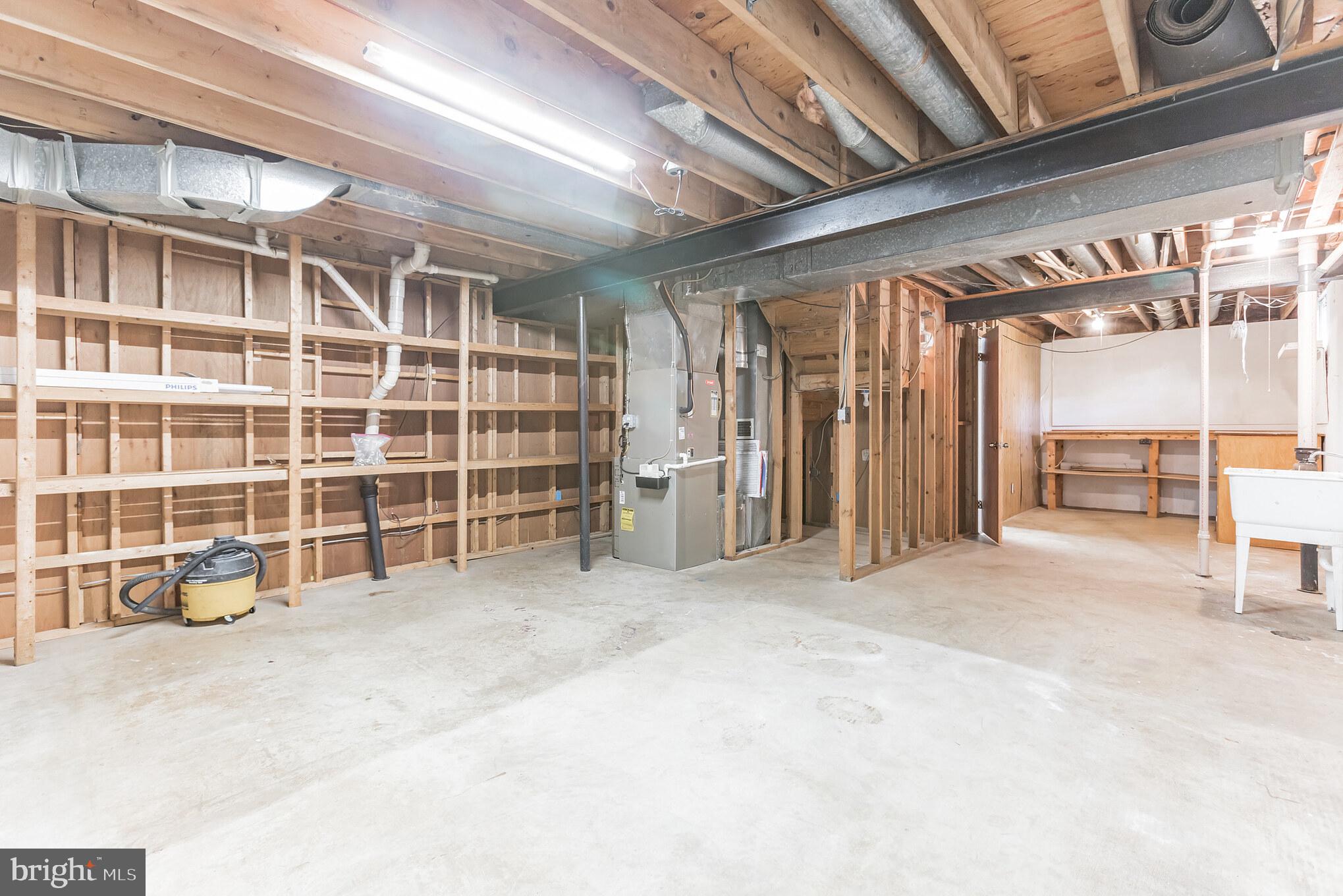 12905 Ruxton Road Silver Spring, MD 20904 - Photo 27 of 31 Huge storage/utility room w/washtub