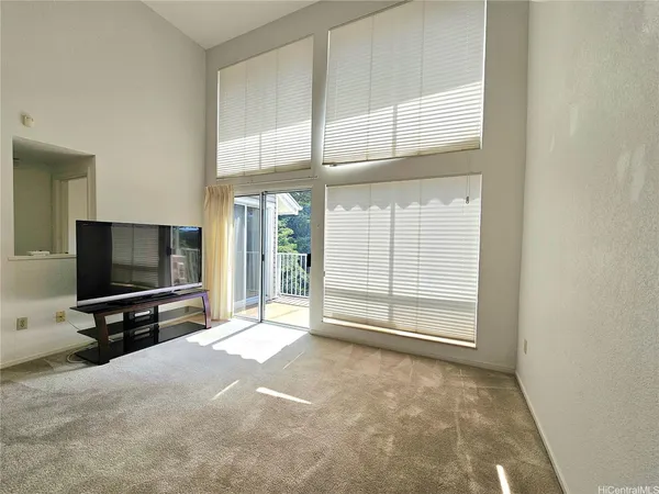 a view of a livingroom with furniture