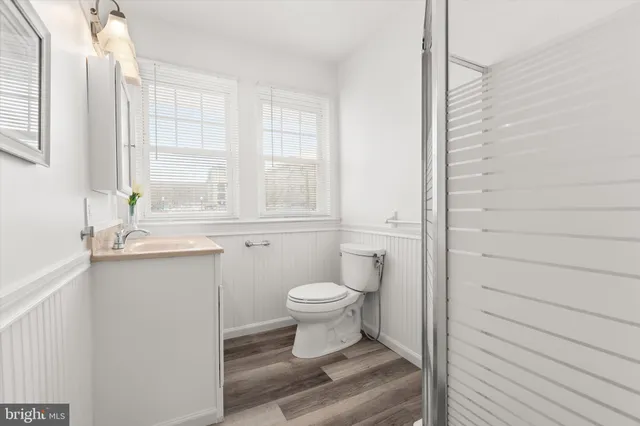 a bathroom with a sink and a shower