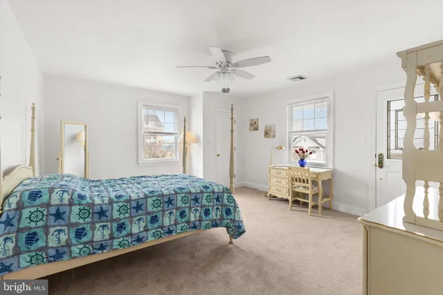 a bedroom with a bed and a cabinets