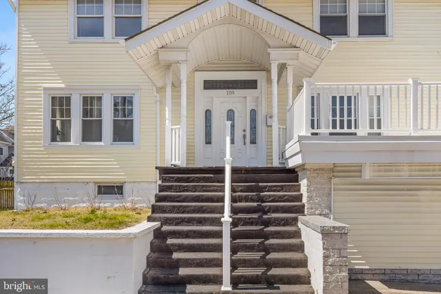 a view of a room with a floor to ceiling window