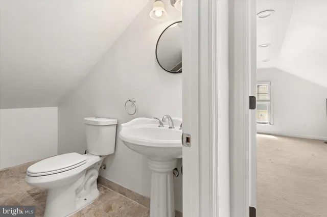 a view of a livingroom with wooden floor