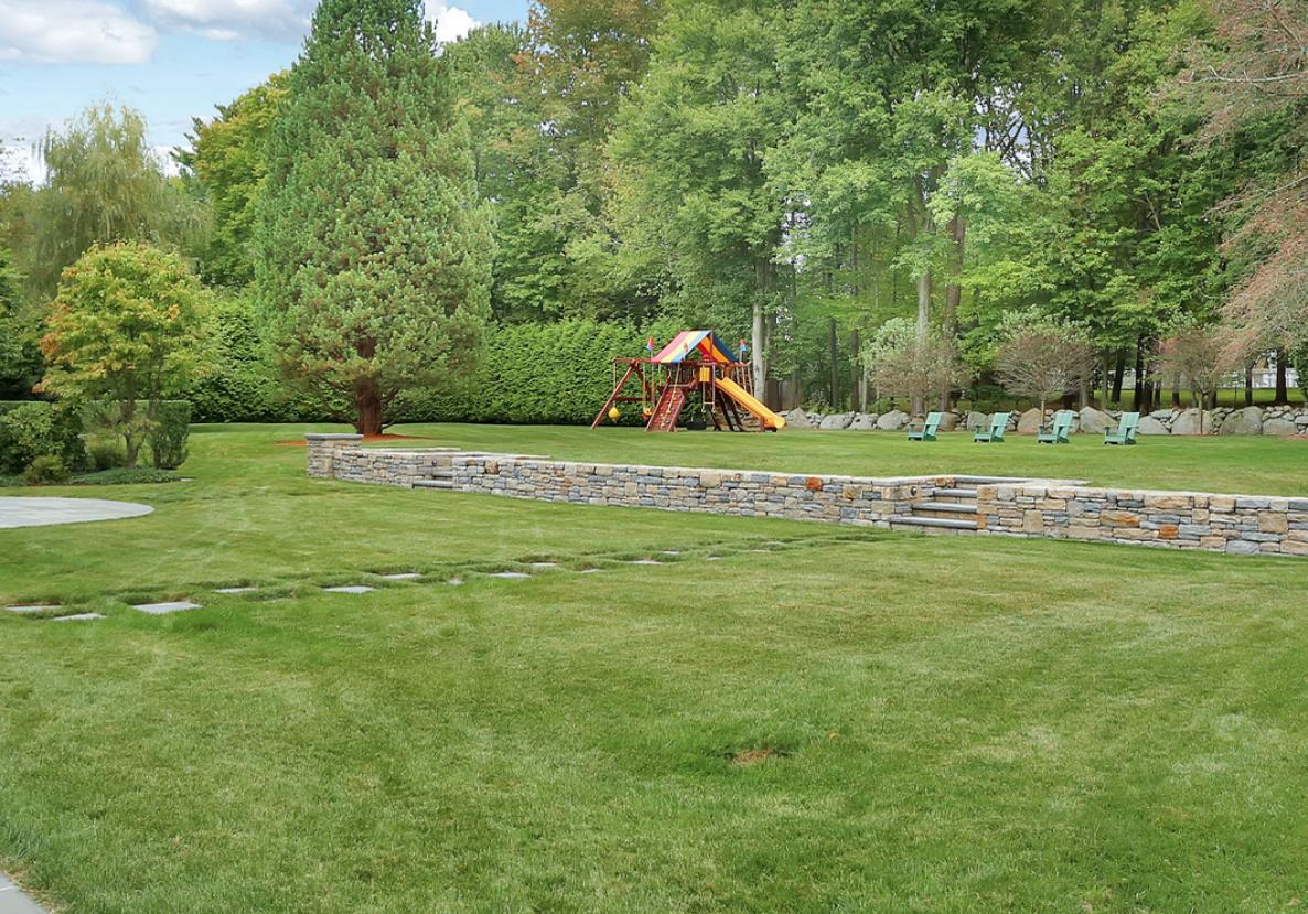 913 Ponus Ridge Road New Canaan, CT 06840 - Photo 26 of 32 a view of a golf course with a park