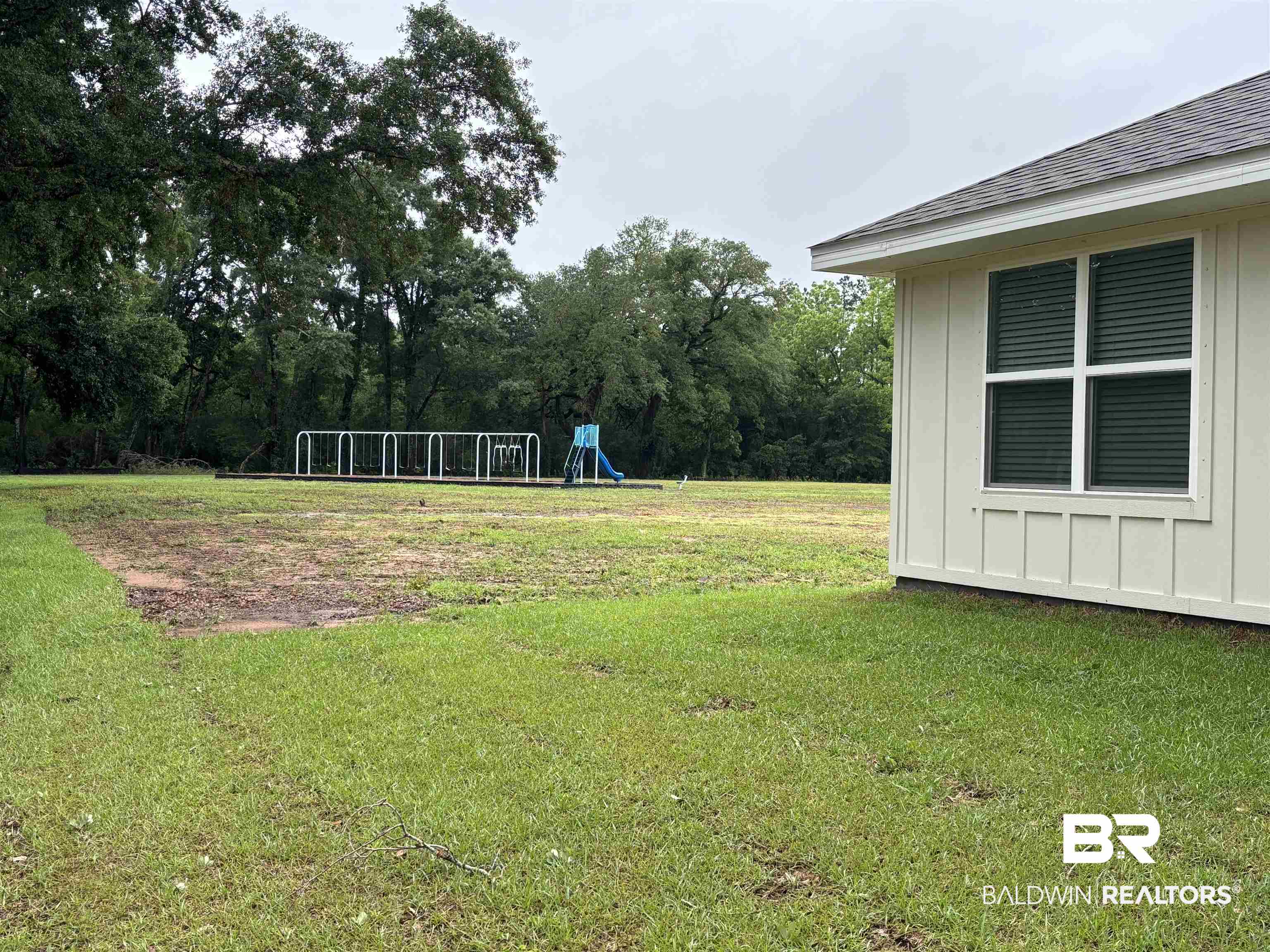 24802 Ponder Loop Loxley, AL 36551 - Photo 5 of 50 Backyard to Playground