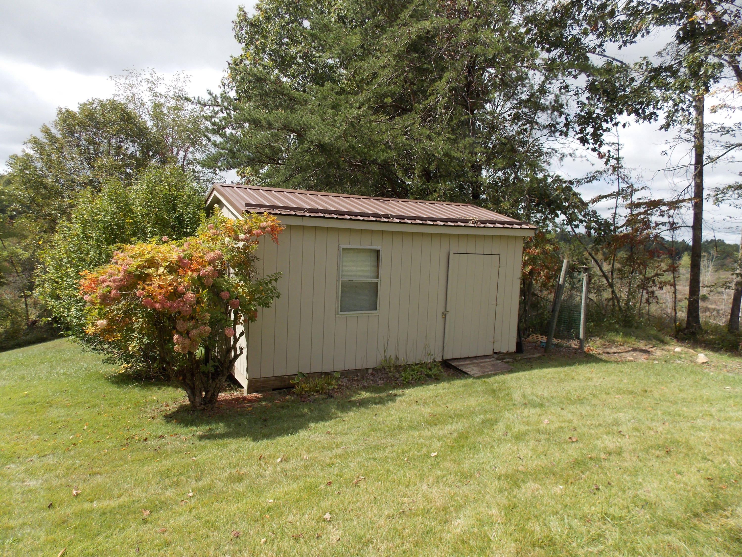 1286 Lester Road Northwest Riner, VA 24149 - Photo 3 of 25 a view of a house with a yard