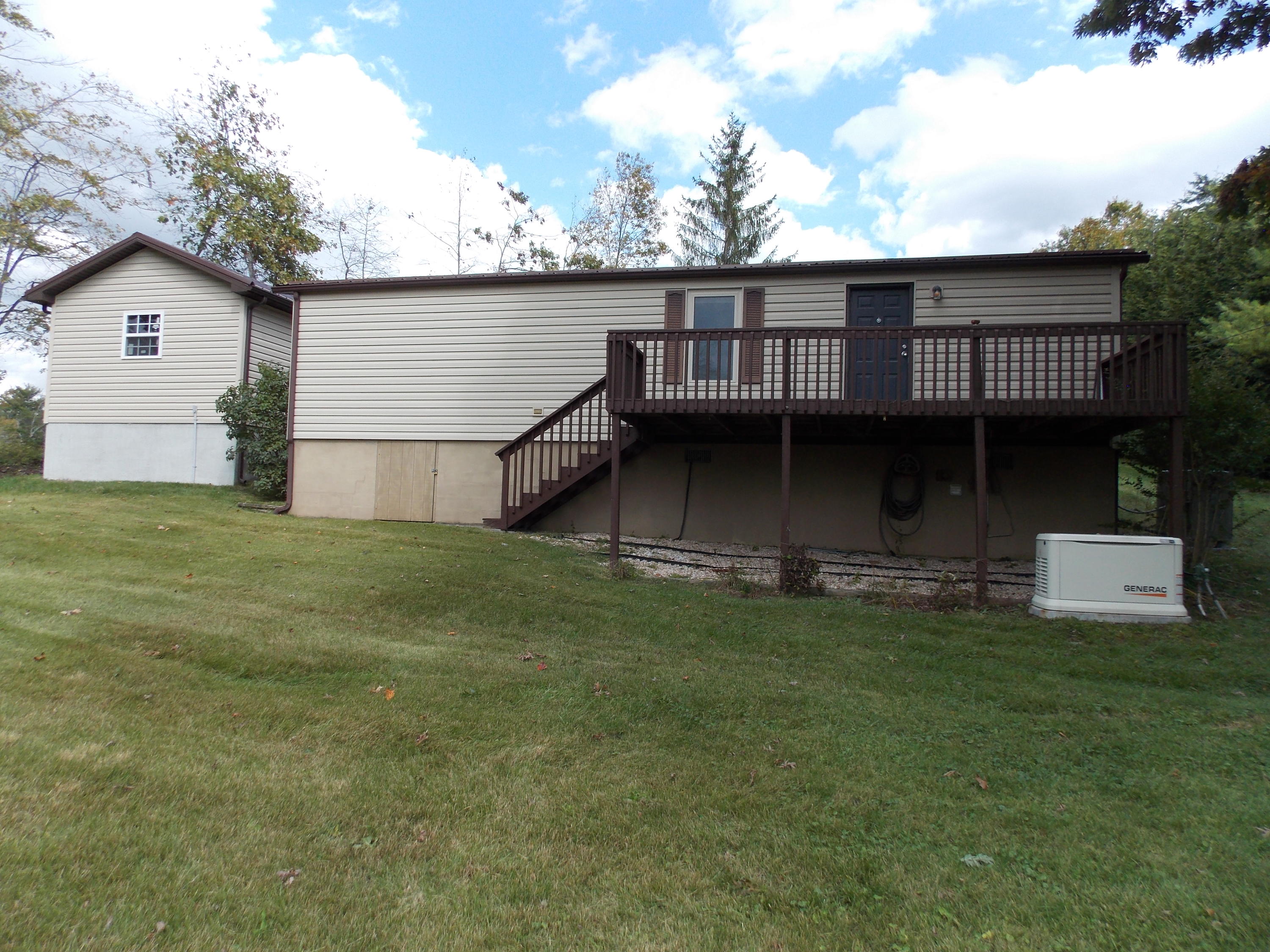 1286 Lester Road Northwest Riner, VA 24149 - Photo 7 of 25 a view of a house with a backyard