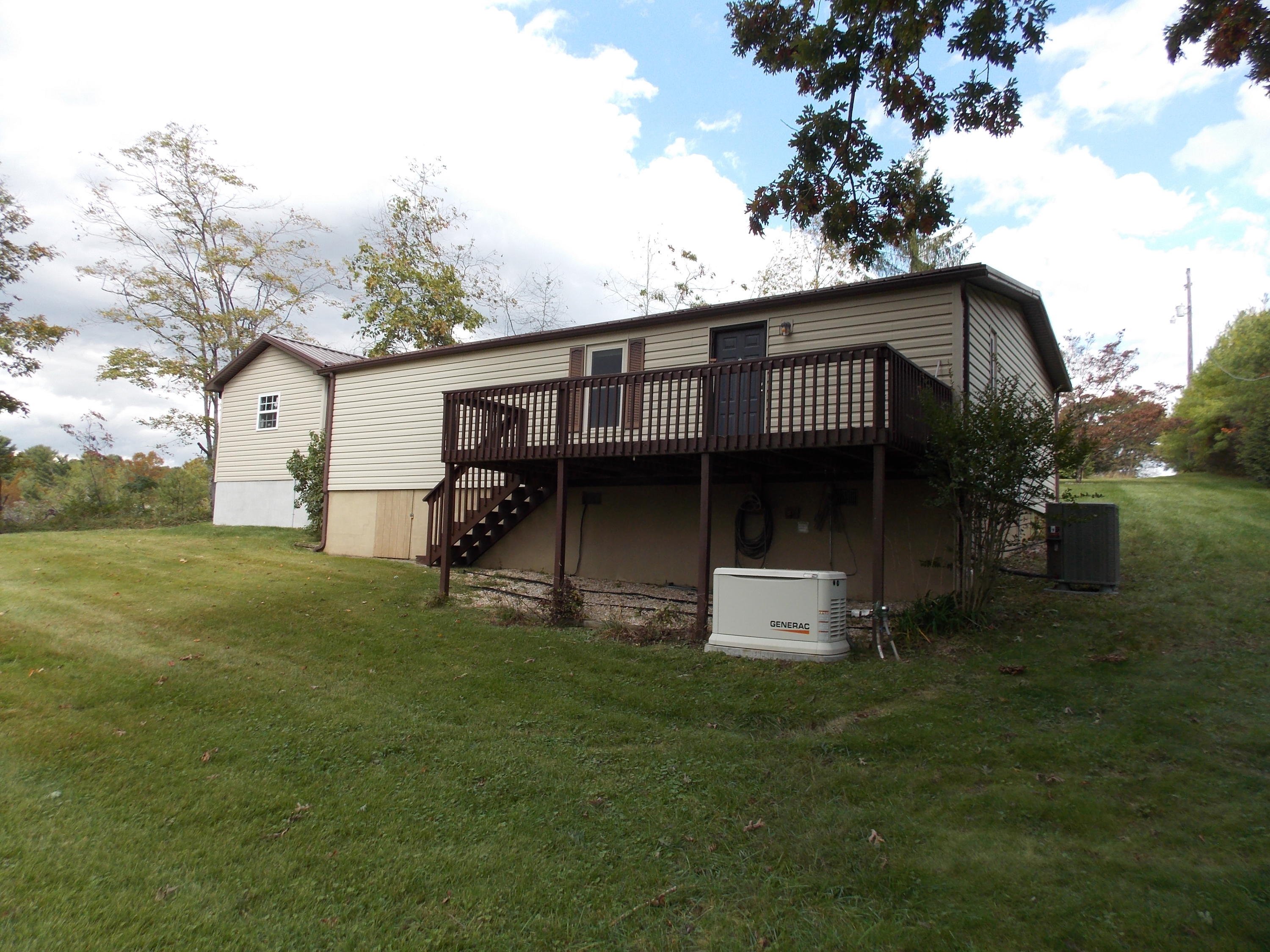 1286 Lester Road Northwest Riner, VA 24149 - Photo 8 of 25 a front view of house with patio and garden