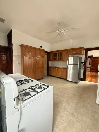 a kitchen that has a stove and a microwave