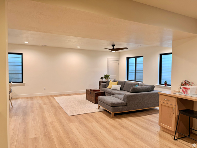 3626 Riverstone Road Mapleton, UT 84664 - Photo 36 of 58 Living area featuring light wood finished floors, a ceiling fan, and recessed lighting