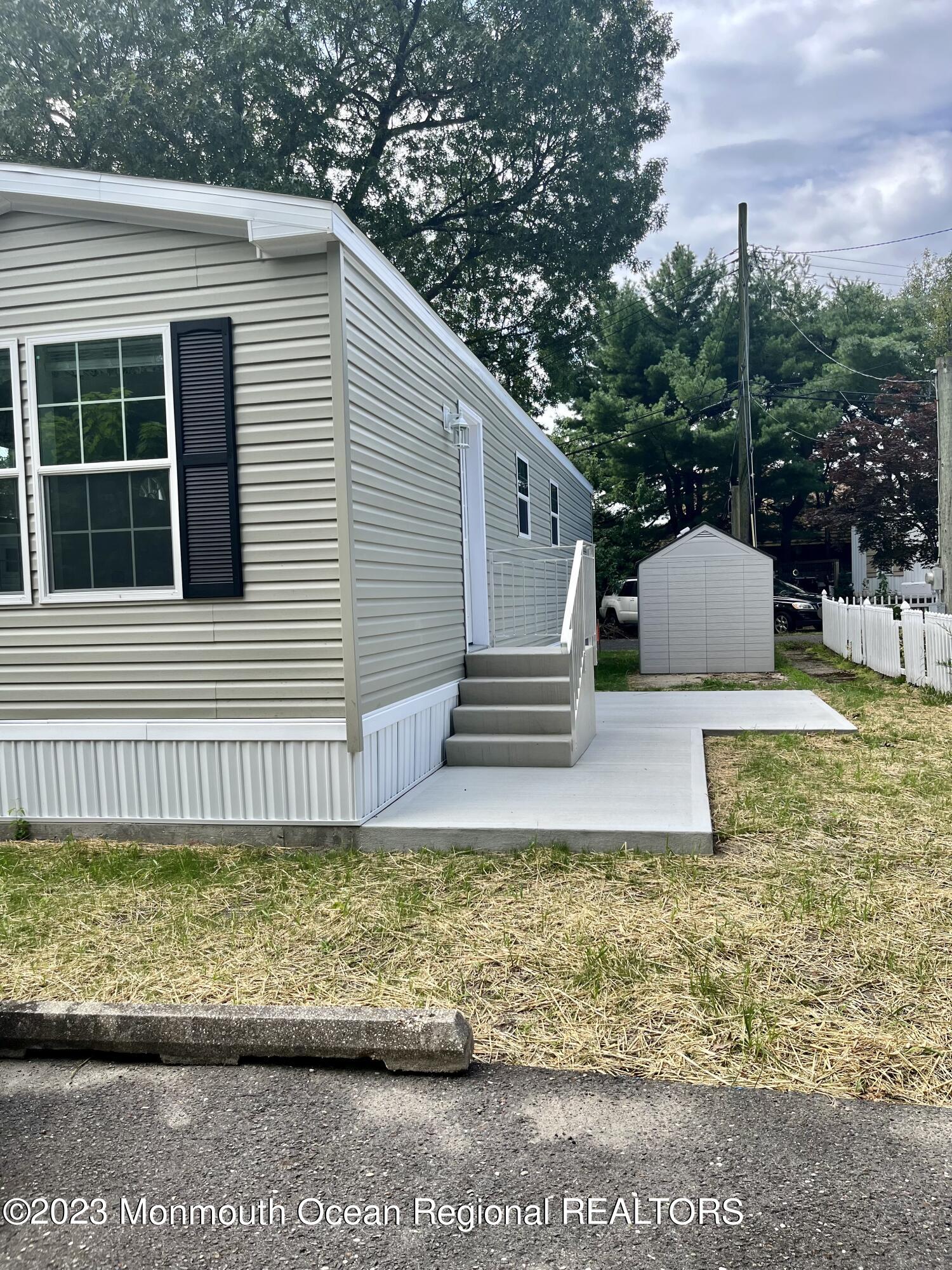 6 C Trail Brick, NJ 08724 - Photo 3 of 17 a view of a house with a yard