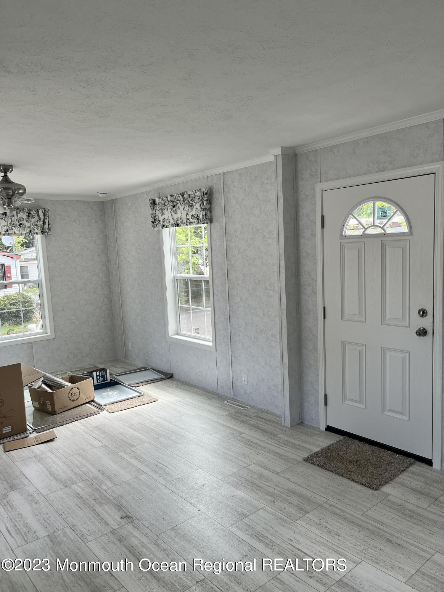 6 C Trail Brick, NJ 08724 - Photo 5 of 17 an empty room with windows and closet