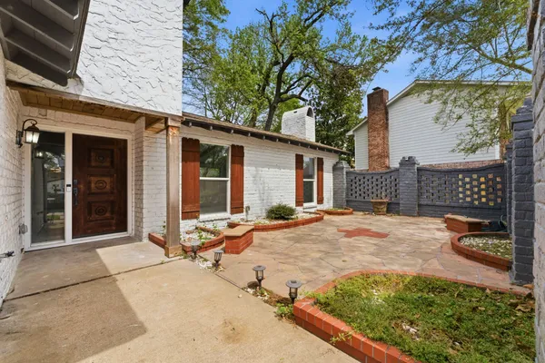 a backyard of a house with seating space