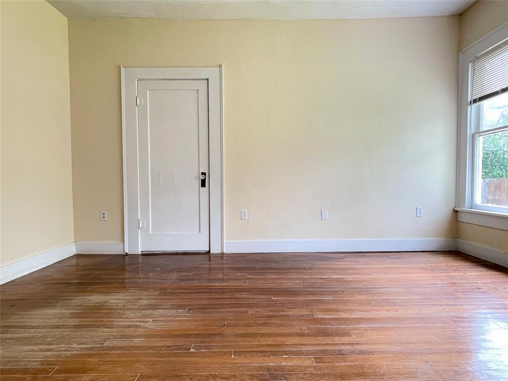 613 Northwest 5th Street Mineral Wells, TX 76067 - Photo 24 of 34 a view of an empty room and window