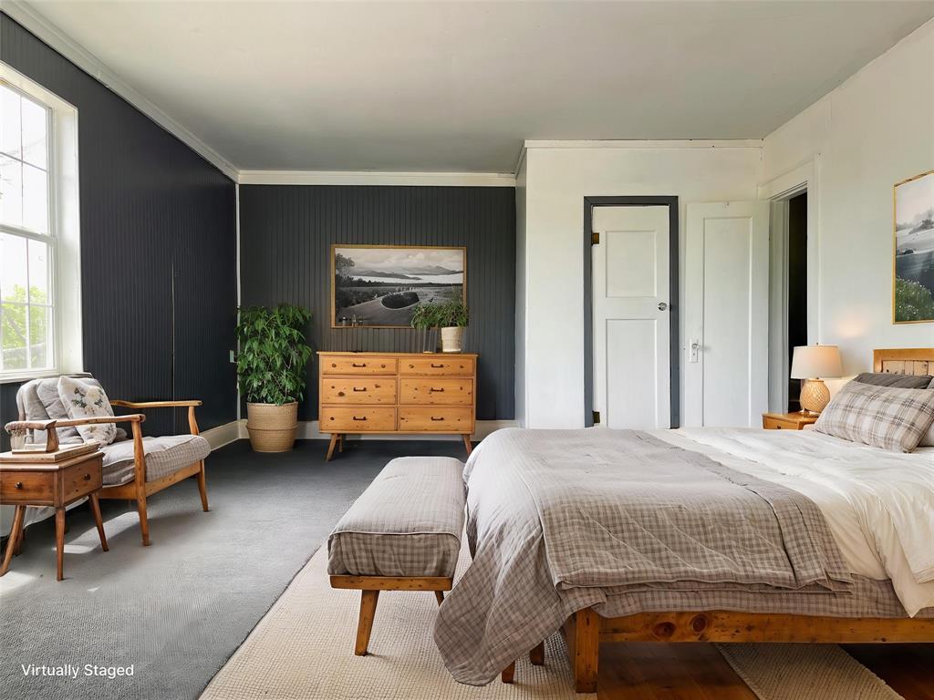 613 Northwest 5th Street Mineral Wells, TX 76067 - Photo 28 of 34 a bedroom with a bed and a couch