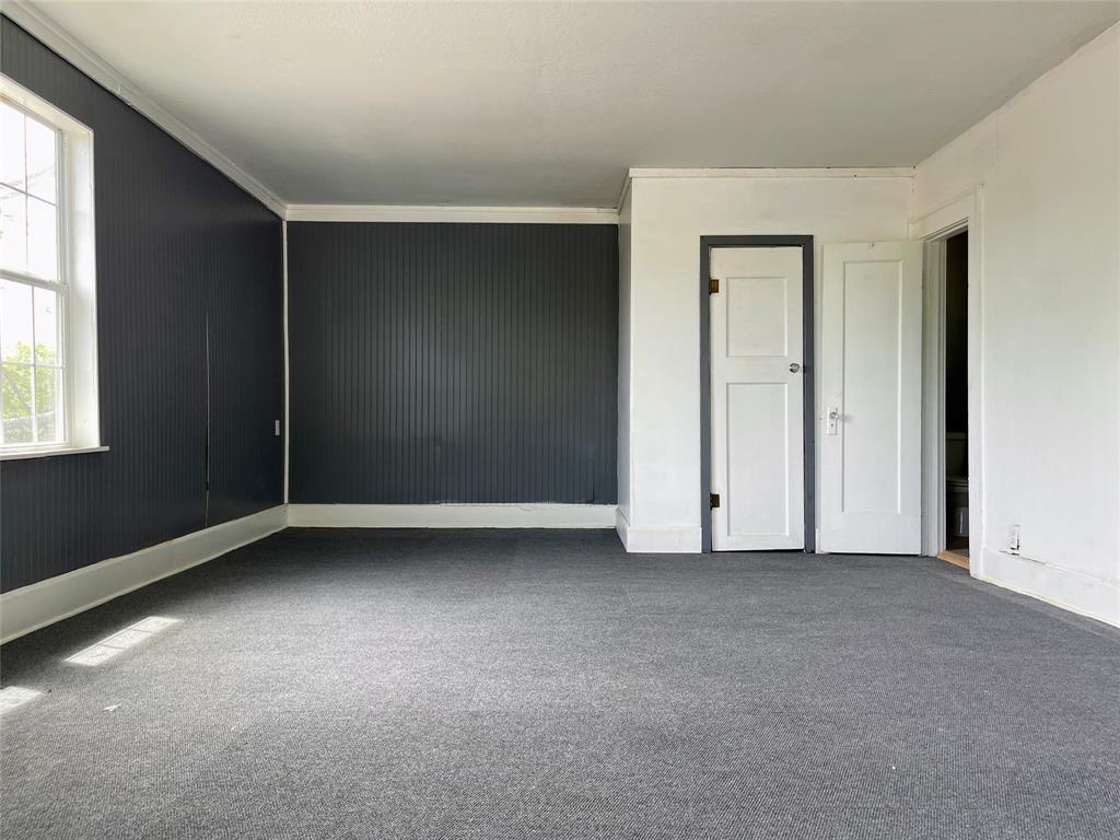 613 Northwest 5th Street Mineral Wells, TX 76067 - Photo 29 of 34 an empty room with window