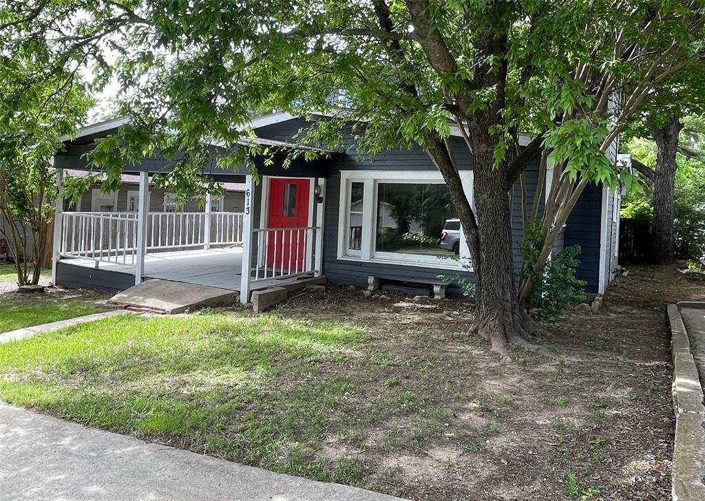 613 Northwest 5th Street Mineral Wells, TX 76067 - Photo 32 of 34 a view of backyard with green space