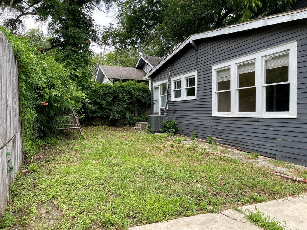 613 Northwest 5th Street Mineral Wells, TX 76067 - Photo 34 of 34 a view of a house with a yard