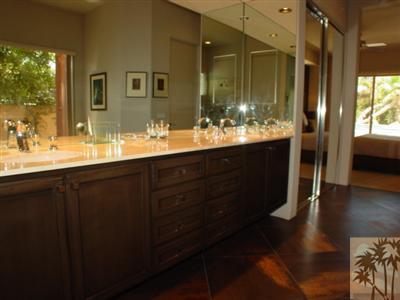12 Silver Circle Rancho Mirage, CA 92270 - Photo 17 of 24 a bathroom with a double vanity sink and a mirror