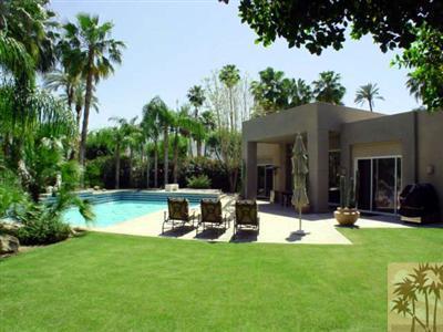 12 Silver Circle Rancho Mirage, CA 92270 - Photo 22 of 24 a view of a chair and table in backyard of the house