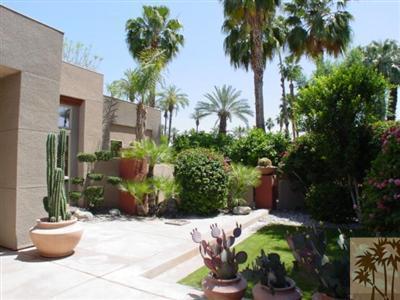 12 Silver Circle Rancho Mirage, CA 92270 - Photo 4 of 24 a front view of a house with a yard and plant