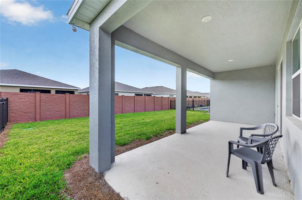 4975 Northwest 39th Loop Ocala, FL 34482 - Photo 44 of 76 a view of a patio with a yard
