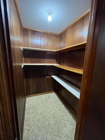 a view of room with cabinets
