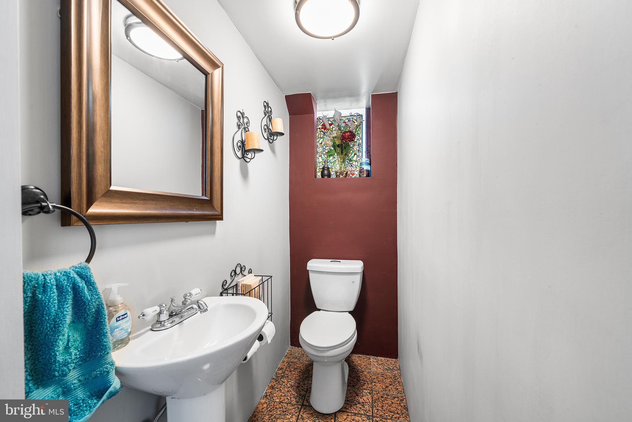 787 North Lewis Road Royersford, PA 19468 - Photo 16 of 53 a bathroom with a toilet sink and mirror