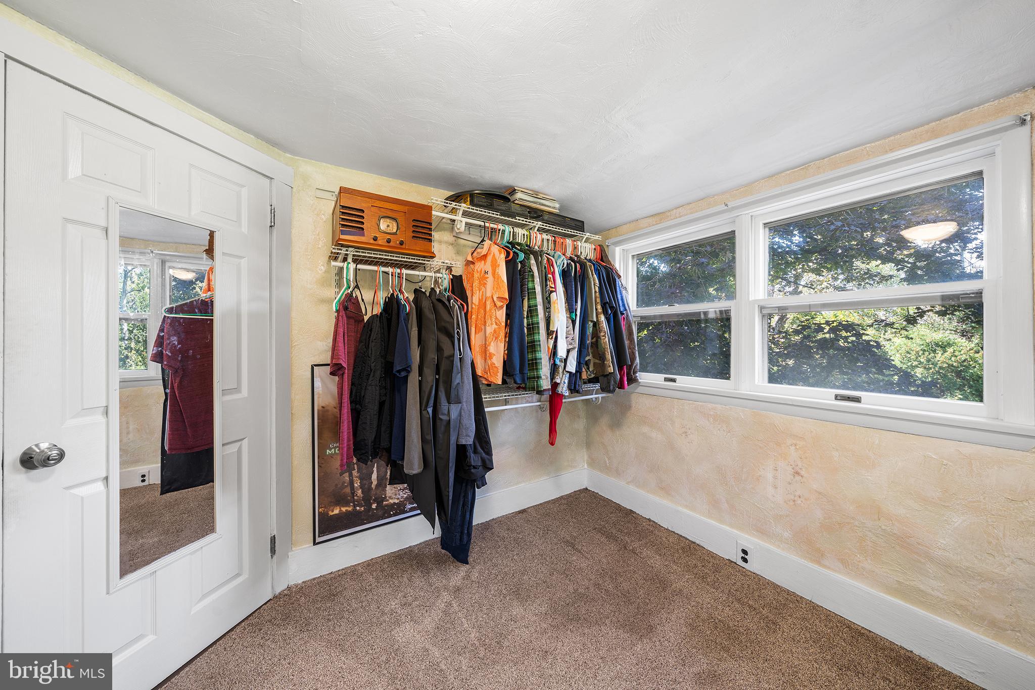 787 North Lewis Road Royersford, PA 19468 - Photo 20 of 53 a view of walk in closet with clothes and shoes