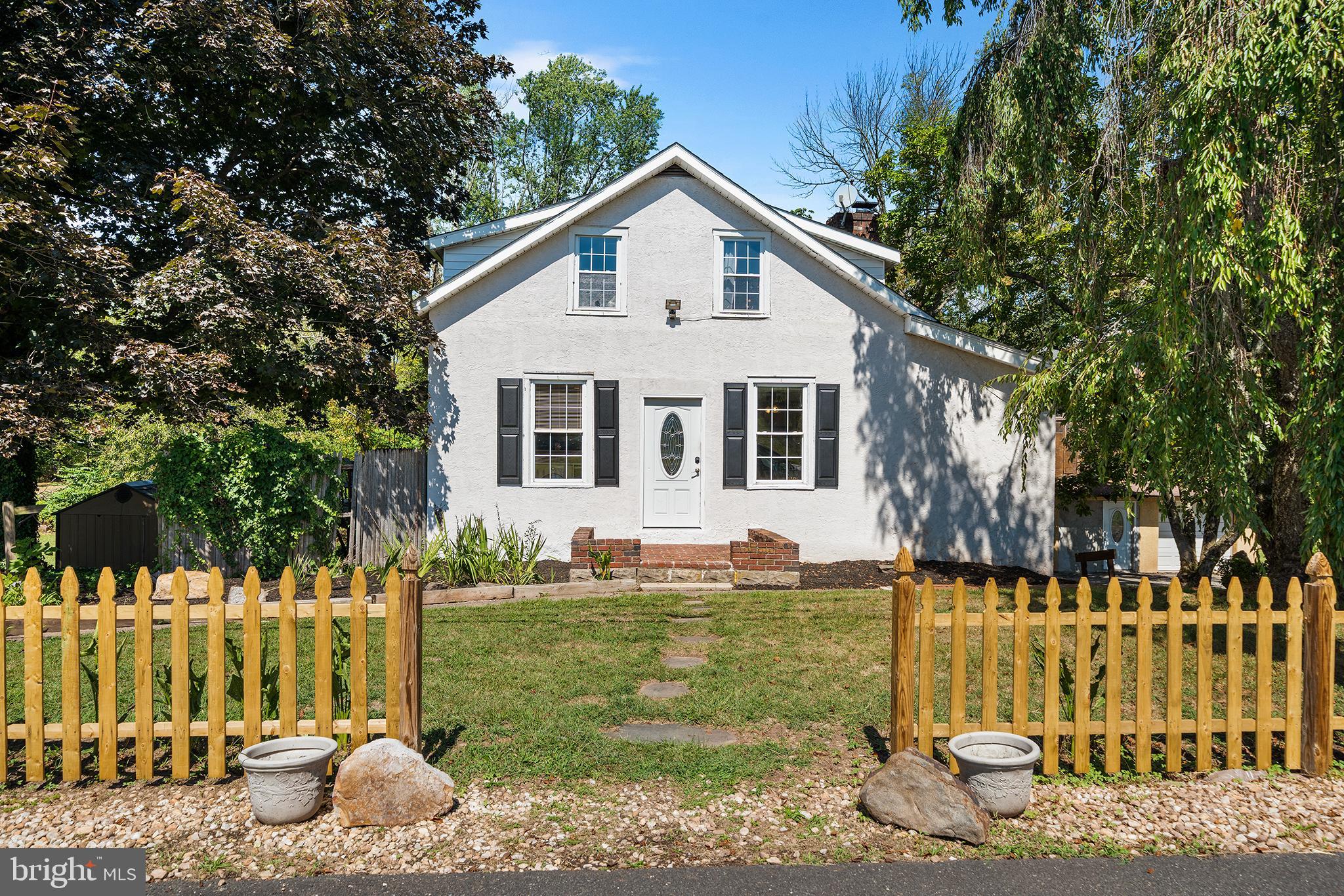 787 North Lewis Road Royersford, PA 19468 - Photo 2 of 53 a front view of a house with a yard