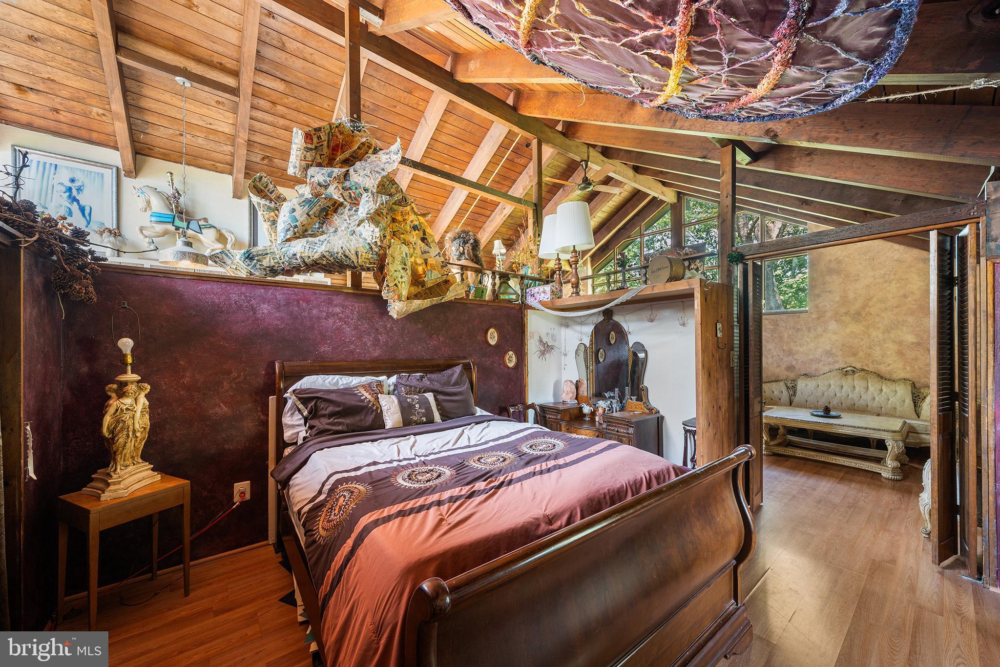 787 North Lewis Road Royersford, PA 19468 - Photo 42 of 53 a bedroom with a bed a standing desk and chair