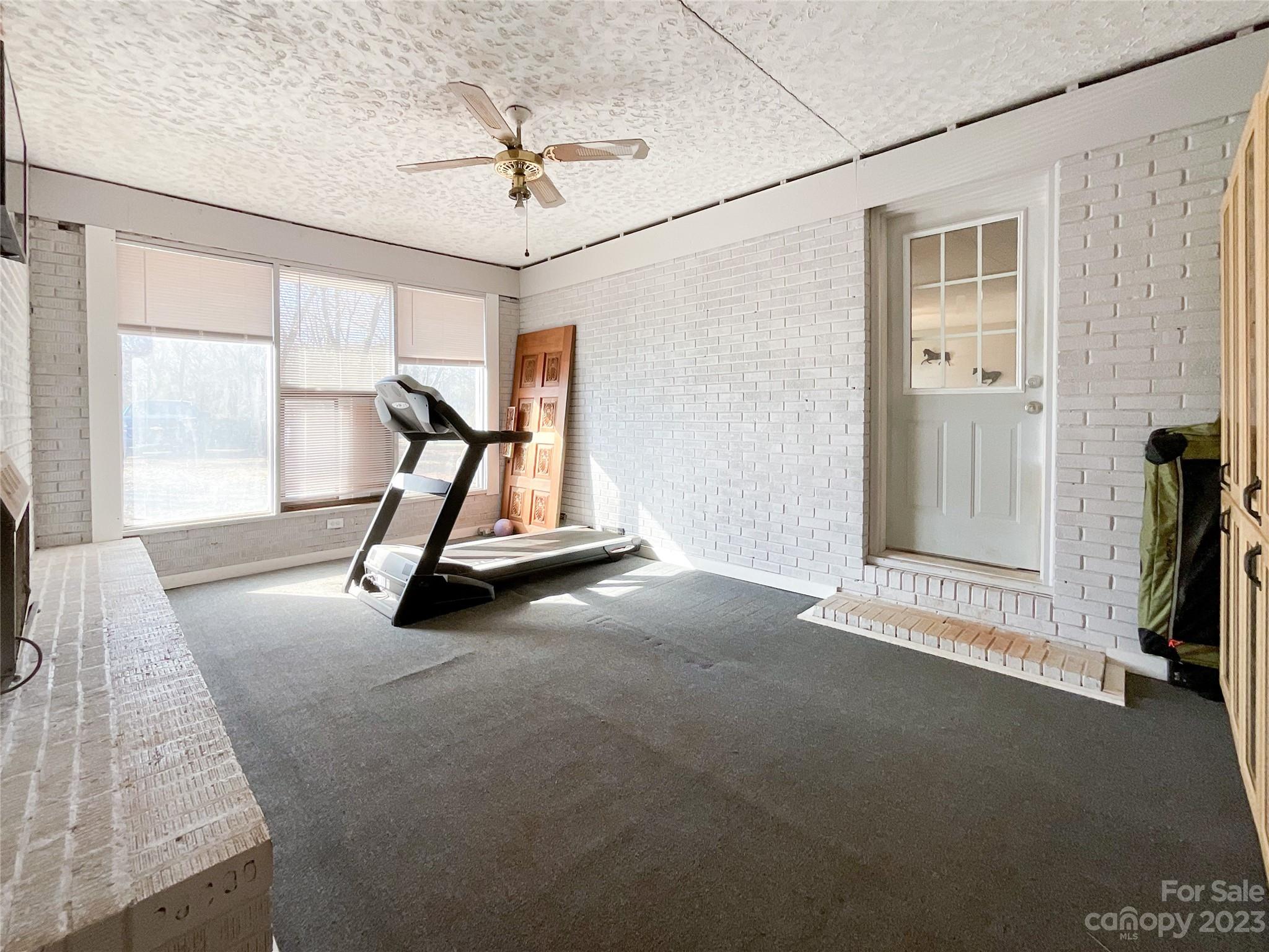 4423 Austin Road Monroe, NC 28112 - Photo 25 of 31 a view of a room with gym equipment