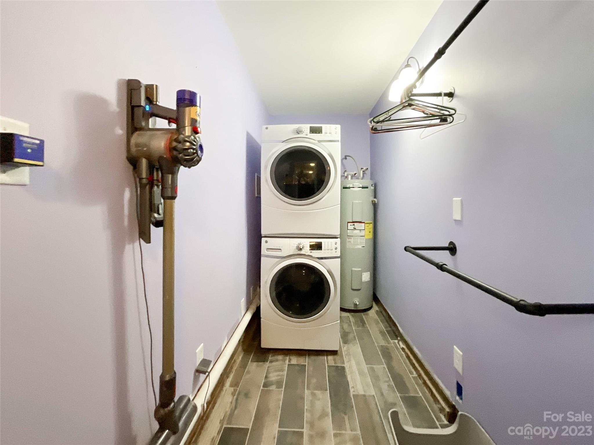 4423 Austin Road Monroe, NC 28112 - Photo 27 of 31 a view of a hallway with washer and dryer