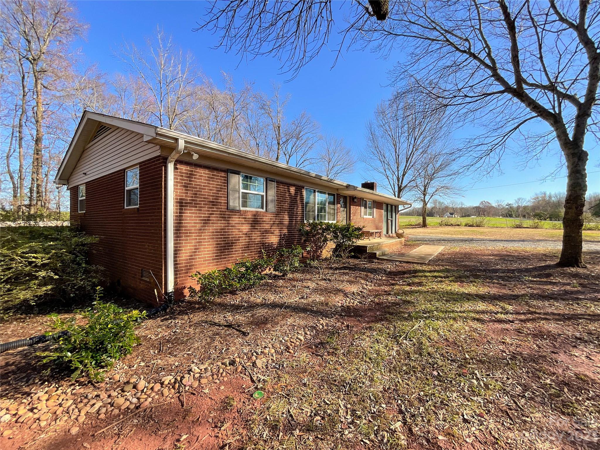 4423 Austin Road Monroe, NC 28112 - Photo 3 of 31 a view of a house with a yard