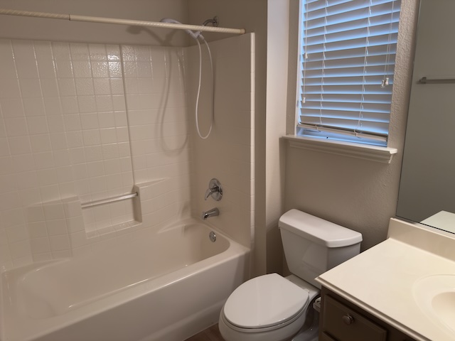 109 Plover Pass Georgetown, TX 78633 - Photo 10 of 25 Bathroom featuring vanity and shower / tub combination