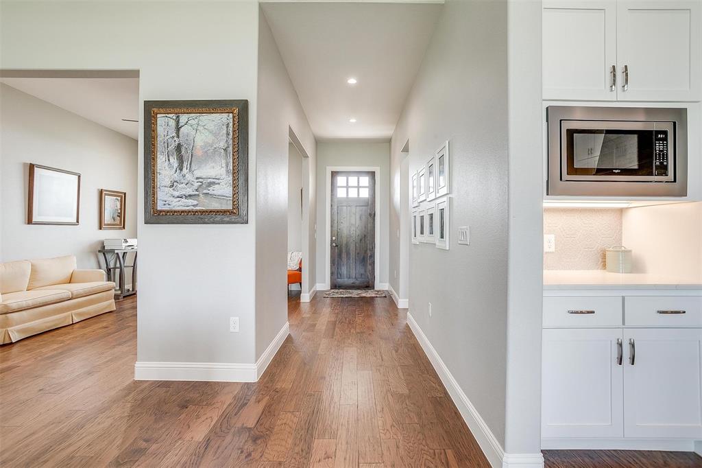7730 Barber Rnch Road Fort Worth, TX 76126 - Photo 3 of 19 Entryway with wood-finish flooring extending into living space