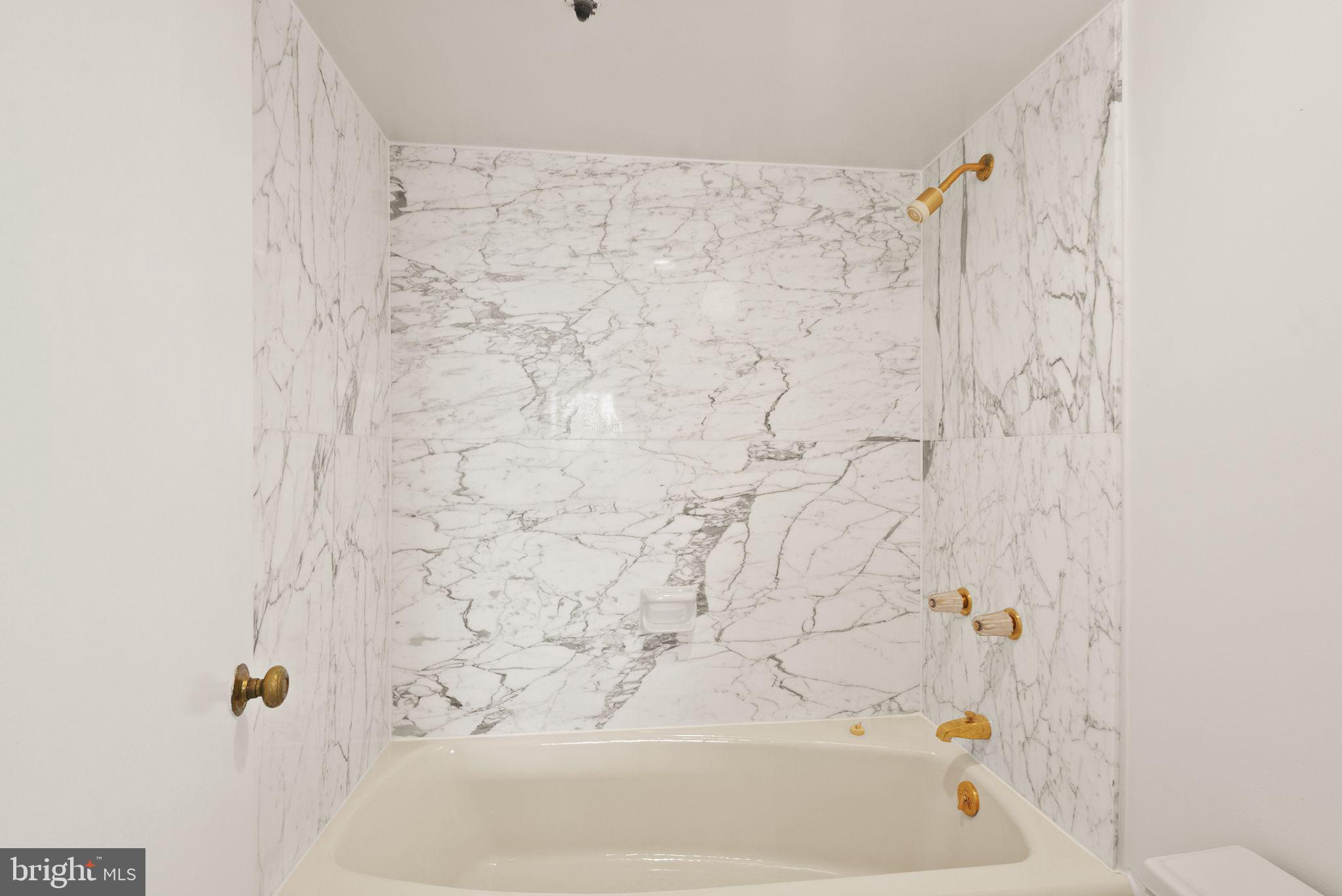 1101 South Arlington Ridge Road, Unit 608 Arlington, VA 22202 - Photo 31 of 53 Primary en-suite bathroom